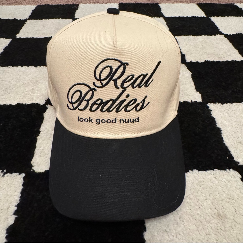 Real Bodies Look Good Nuud Black and Cream Cap